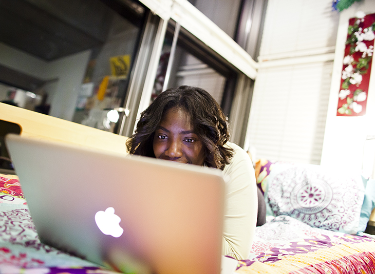 student in front of computer