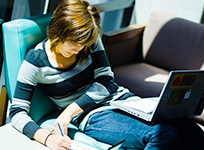 student in chair